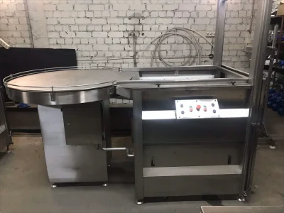 01-ustrojjstvo-dlja-ukladki-banok-v-korziny-avtoklava - фото 1